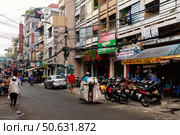 Everyday Busy Street in Ho Chi Minh City, Vietnam During Daytime (2024 год). Редакционное фото, фотограф Aleksandr Golubev / Фотобанк Лори