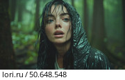 Young Woman in Forest During Rain Wearing a Hooded Jacket With Intense Expression on Her Face. Стоковое AI-видео, аниматор Юлия Гапеенко / Фотобанк Лори