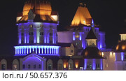 Castles Night Illumination China: Nighttime architectural lighting showcasing illuminated castle structures in China. Стоковое видео, видеограф svetograph / Фотобанк Лори