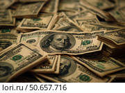 Pile of one hundred dollar bills showing benjamin franklin. Стоковое AI-изображение, AI-художник Иван Рябоконь / Фотобанк Лори