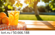 picnic orange juice in plastic cup mockup ai generated. Стоковое AI-изображение, AI-художник Vectorwin / Фотобанк Лори