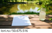 outdoor white notepad ai generated. Стоковое AI-изображение, AI-художник Vectorwin / Фотобанк Лори