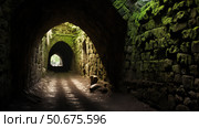 stone light at the end of a tunnel ai generated. Стоковое AI-изображение, AI-художник Vectorwin / Фотобанк Лори