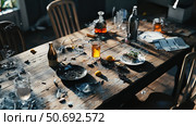 disorganized messy table. Стоковое фото, фотограф Vectorwin / Фотобанк Лори