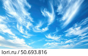 tranquil blue sky wispy clouds. Стоковое фото, фотограф Vectorwin / Фотобанк Лори