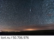Iridium satellite flare in southern Alberta, Canada. Стоковое фото, фотограф Alan Dyer/Stocktrek Images / ТАСС / Фотобанк Лори