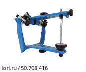 Blue metallic articulator used in dentistry. Стоковое фото, фотограф Elena Duvernay/Stocktrek Images / ТАСС / Фотобанк Лори