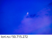 Conjunction of the waxing crescent Moon with Venus in twilight clouds. Стоковое фото, фотограф Alan Dyer/Stocktrek Images / ТАСС / Фотобанк Лори