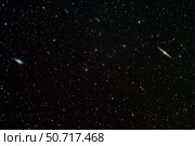Galaxies NGC 4559 and NGC 4565. Стоковое фото, фотограф Phillip Jones/Stocktrek Images / ТАСС / Фотобанк Лори