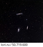 A small group of galaxies known as the Leo Triplet. Стоковое фото, фотограф Phillip Jones/Stocktrek Images / ТАСС / Фотобанк Лори