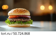 beef burger on a white table. Стоковое фото, фотограф Vectorwin / Фотобанк Лори