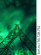 Powerlines and aurora borealis, Tjeldsundet, Norway. Стоковое фото, фотограф Arild Heitmann/Stocktrek Images / ТАСС / Фотобанк Лори