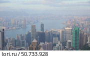 Panoramic view of Hong Kong Skyline and Victoria Harbor. City landscape of the famous travel landmark, aerial view of Hong Kong, Victoria Harbour. Slow motion footage. Стоковое видео, видеограф Ирина Михайличенко / Фотобанк Лори