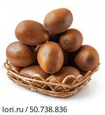 Fresh kiwi fruits piled in a wicker basket. Стоковое AI-изображение, AI-художник Иван Рябоконь / Фотобанк Лори