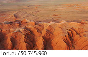 Bayanzag flaming cliffs at sunset in Mongolia. Стоковое фото, фотограф Михаил Коханчиков / Фотобанк Лори