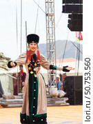 ELANTSY, IRKUTSK REGION, RUSSIA - July 5, 2025: Erdynskie Games– festival of nomadic peoples of Eurasia. Beautiful Buryat girl in national costume on open stage in Beauty Contest. Редакционное фото, фотограф Виктория Катьянова / Фотобанк Лори