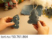 Handmade felt toys on a beige background.Christmas tree made from old denim. Стоковое фото, фотограф Оксана Шведкова / Фотобанк Лори