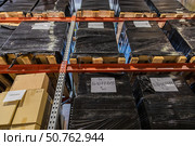 Wrapped pallets storing goods in a warehouse logistics center. Стоковое фото, фотограф Юрий Поздников / Фотобанк Лори