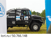 ANGARSK, IRKUTSK REGION, RUSSIA - July 13, 2025: XV International Silk Way Rally, racing competition. Famous team of champions on sports truck №303 KAMAZ-master before start of second stage. Редакционное фото, фотограф Виктория Катьянова / Фотобанк Лори