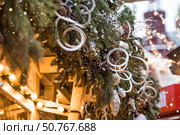 New Year's card 2026. Fabulous Christmas background. Festive toys on the New Year tree in Moscow. The concept of preparing and decorating for the new year. Стоковое фото, фотограф Photojuli / Фотобанк Лори