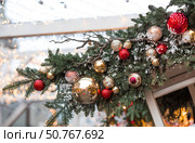 New Year's card 2026. Fabulous Christmas background. Festive toys on the New Year tree in Moscow. The concept of preparing and decorating for the new year. Стоковое фото, фотограф Photojuli / Фотобанк Лори