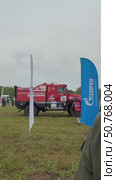 ANGARSK, IRKUTSK REGION, RUSSIA - July 13, 2025: XV International Rally Silk Way, racing competitions. Famous Belarusian team of Sergey Vyazovich on sports truck №302 MAZ-SPORT before start . Vertical video. Редакционное видео, видеограф Виктория Катьянова / Фотобанк Лори