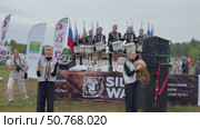 ANGARSK, IRKUTSK REGION, RUSSIA - July 13, 2025: XV International Silk Way Rally, racing competition.Video of group of beautiful drummers girls perform on open stage before start of motor rally on rainy day. Редакционное видео, видеограф Виктория Катьянова / Фотобанк Лори