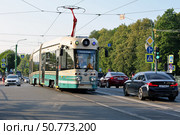 Санкт-Петербург. Стилизованный под ретро трамвай 71-431Р "Достоевский" на Садовой улице. Редакционное фото, фотограф Александр Тарасенков / Фотобанк Лори
