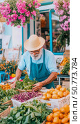 Elderly Man Selling Fresh Produce at a Vibrant Farmers Market. Стоковое AI-изображение, AI-художник Данила Большаков / Фотобанк Лори