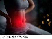 Menstrual pain, woman with stomachache suffering from pms, endometriosis, cystitis and other diseases of the urinary system. Стоковое AI-изображение, AI-художник Станислав Тарко / Фотобанк Лори