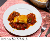 Appetizing cod served with samfaina vegetables. Стоковое фото, фотограф Яков Филимонов / Фотобанк Лори