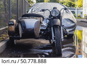 An old-fashioned motorcycle with a sidecar next to a residential building. Стоковое фото, фотограф Михаил Яковлев / Фотобанк Лори