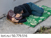 Homeless man sleeping. Poverty concept. Стоковое фото, фотограф Михаил Яковлев / Фотобанк Лори