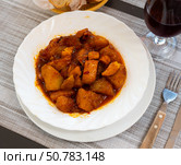 Patatas con sepia, stewed cuttle with potatoes. Стоковое фото, фотограф Яков Филимонов / Фотобанк Лори