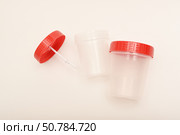 Jars for urine and fecal tests. Containers for medical tests. Стоковое фото, фотограф Valeriy Lushchikov / Фотобанк Лори
