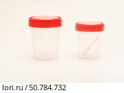 Jars for urine and fecal tests. Containers for medical tests. Стоковое фото, фотограф Valeriy Lushchikov / Фотобанк Лори