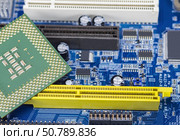 Процессор на материнской плате. Central Processing Unit CPU on the motherboard. Стоковое фото, фотограф Татьяна Д / Фотобанк Лори