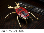 Electronic bug exploring motherboard, symbol of hardware vulnerability. Стоковое AI-изображение, AI-художник Иван Рябоконь / Фотобанк Лори