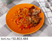Barley with cabbage served with fried brisket. Стоковое фото, фотограф Яков Филимонов / Фотобанк Лори