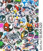 Novosibirsk, Russia - March 1, 2025: Cartoon-style vinyl stickers featuring Venom in various comic book situations. Редакционное фото, фотограф Виталий Сова / Фотобанк Лори