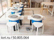 Automatic potter's wheels in equipped work room. Стоковое фото, фотограф Яков Филимонов / Фотобанк Лори