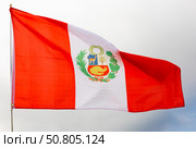 Flag of Peru waving on cloudy sky during daytime. Стоковое фото, фотограф Яков Филимонов / Фотобанк Лори