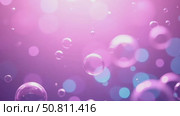 Soap bubbles rise up on a purple background. Стоковое AI-видео, аниматор ketpro.design / Фотобанк Лори