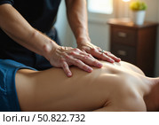 Массажист делает массаж мужчине. A massage therapist massages a man. Стоковое AI-изображение, AI-художник Смирнова Светлана / Фотобанк Лори