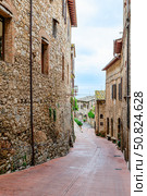 A walled medieval hill town San Gimignano, famous for its Romanesque and Gothic architecture, Italy (2015 год). Стоковое фото, фотограф Татьяна  Бральнина / Фотобанк Лори
