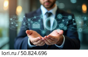 Payroll Management and Financial Processing System. Businessman works on payroll management with icons for payment, employee salaries, scheduling, analysis finance, and efficient planning. Стоковое AI-изображение, AI-художник Sergey Grishin / Фотобанк Лори