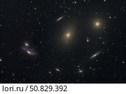 The Virgo Galaxy Cluster known as Markarian's Chain. Стоковое фото, фотограф Roth Ritter/Stocktrek Images / ТАСС / Фотобанк Лори