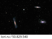 A small group of galaxies known as the Leo Triplet. Стоковое фото, фотограф Roth Ritter/Stocktrek Images / ТАСС / Фотобанк Лори