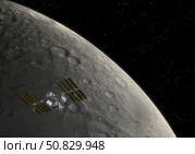 The International Space Station transits towards the limb of the moon. Стоковое фото, фотограф Steven Hobbs/Stocktrek Images / ТАСС / Фотобанк Лори