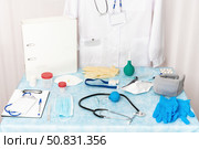 A collection of objects, medical equipment, instruments, supplies, and documents at a medical clinic. Стоковое фото, фотограф А. А. Пирагис / Фотобанк Лори